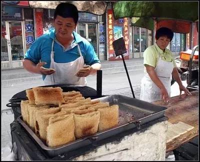 石家庄缸炉烧饼加油图片